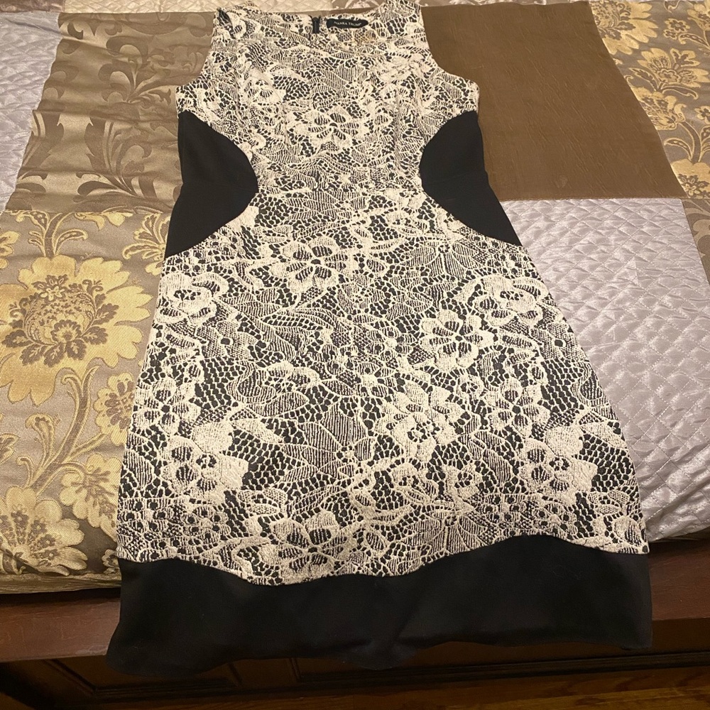 Black and lace pattern fitted dress